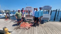 Group of 6 people enjoying fishing in Destin