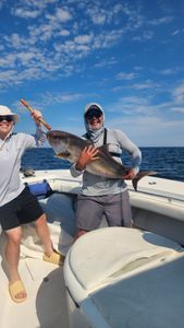 Two people on a fishing tour in Destin