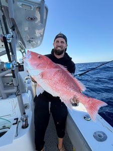 Red snapper caught fishing in Holmes Beach FL displayed on boat deck