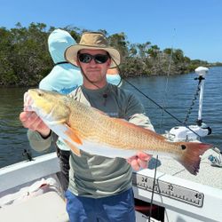 Photograph of a 27-inch Redfish caught while fishing in Holmes Beach