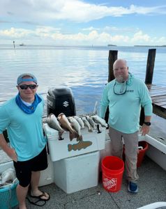 Two anglers fishing at Holmes Beach