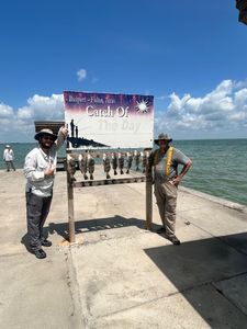 Two people enjoying fishing in Rockport