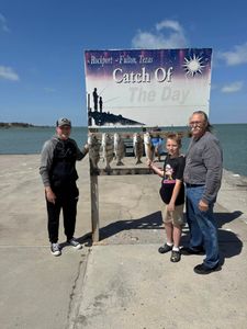 Three people fishing in Rockport