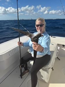 Two people fishing in FL