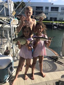Four people fishing in West Palm Beach