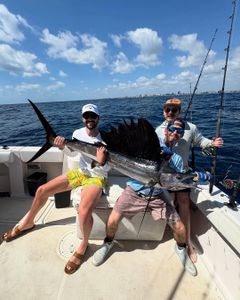 Anglers with a sailfish catch near West Palm Beach