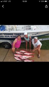 Three people fishing at Pensacola