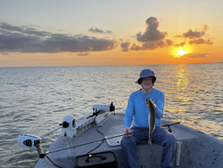 A person fishing in Port Aransas