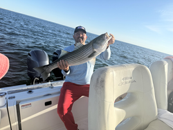 Nice striped bass caught using deep sea jigging in clear conditions off Yarmouth!