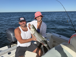 Nice striped bass using deep sea jigging in clear conditions!