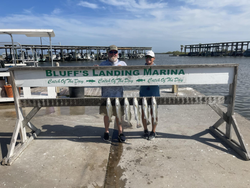 Two anglers enjoying a fishing trip in TX