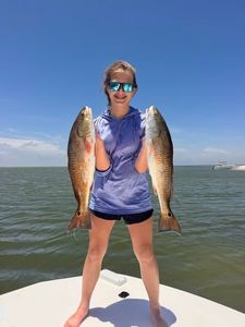 Two redfish caught during fishing trip in Corpus Christi TX