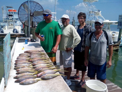 Four friends enjoying a fishing trip in Islamorada