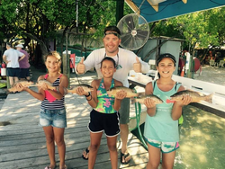 Four people fishing for two 14-inch fish in Islamorada