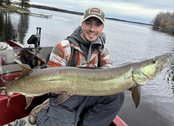 Angler with a 35-inch fish caught while fishing in Minocqua