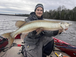 A lone fisherman in Minocqua, Wisconsin, catches a 42-inch fish.