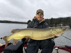 A lone muskellunge, a large freshwater fish, caught while fishing in WI.