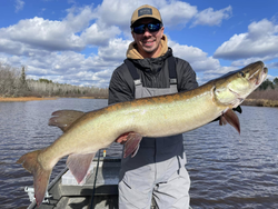 A muskellunge fish caught by a person in Minocqua