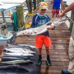 Angler fishing in Jacksonville with two fish
