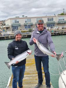 Two anglers fishing for rainbow trout in Port Washington