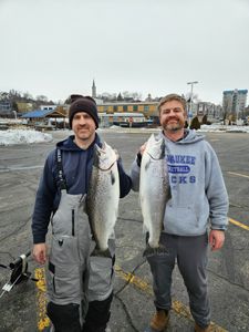 Two anglers with a catch of Atlantic Salmon and Rainbow Trout in WI