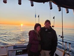 Two people on a cruising and fishing trip in Port Washington