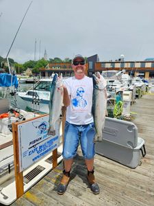 Two pink salmon, 25 inches long, caught while fishing in Port Washington