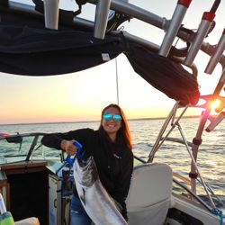 A rainbow trout, a 16-inch fish, caught in WI during a fishing trip