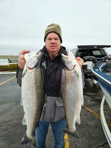 Two rainbow trout caught in Port Washington