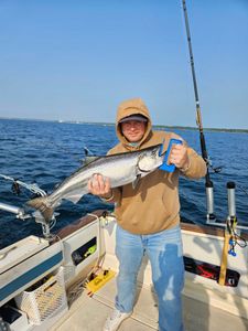 A person fishing with a fishing rod in Wisconsin