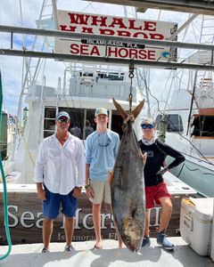 3 anglers with a big 44-inch fish in Islamorada, Florida