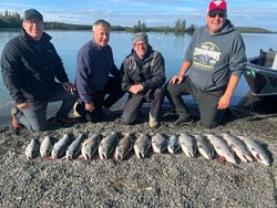 Four people fishing in Alaska