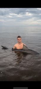 Young angler with a massive bull shark!