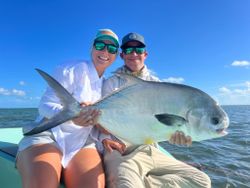 A photograph of a 33-inch Permit fish caught while fishing in Florida.