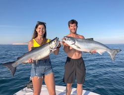 Two Chinook salmon, 32 inches, fishing in MI
