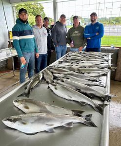 6 people fishing in Traverse City