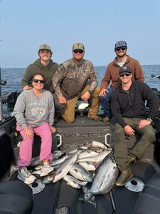 5 people fishing in Traverse City