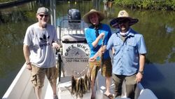 Three people fishing in Crystal River