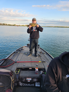 Drifting through the rainy day in search of the best fishing spots.