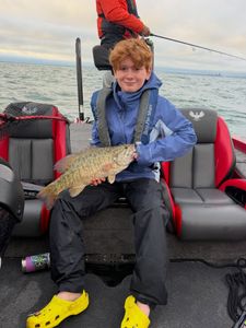 Freshly caught smallmouth bass displayed on fishing boat in North Tonawanda NY