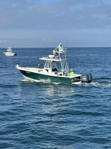 Partly cloudy skies set the stage for an epic day of deep sea jigging!