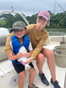 Two people enjoying fishing and water sports in VA.