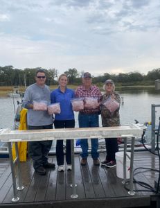 Four friends fishing in Kingston