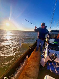 A person fishing in OK