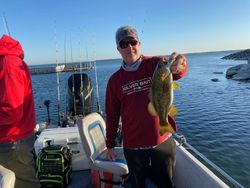 Angler catching fish in Kingston