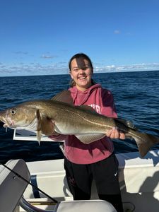 One lone angler fishing in MA