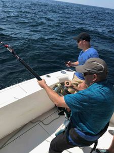 Person fishing in unknown location