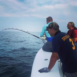 Two people fishing in MA