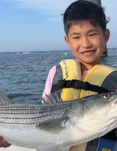 A person fishing in Scituate