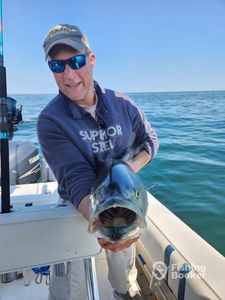 A person fishing in Massachusetts